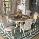 Caelum 7-Piece Round Dining Set with White Fabric Upholstery by The Gray Barn